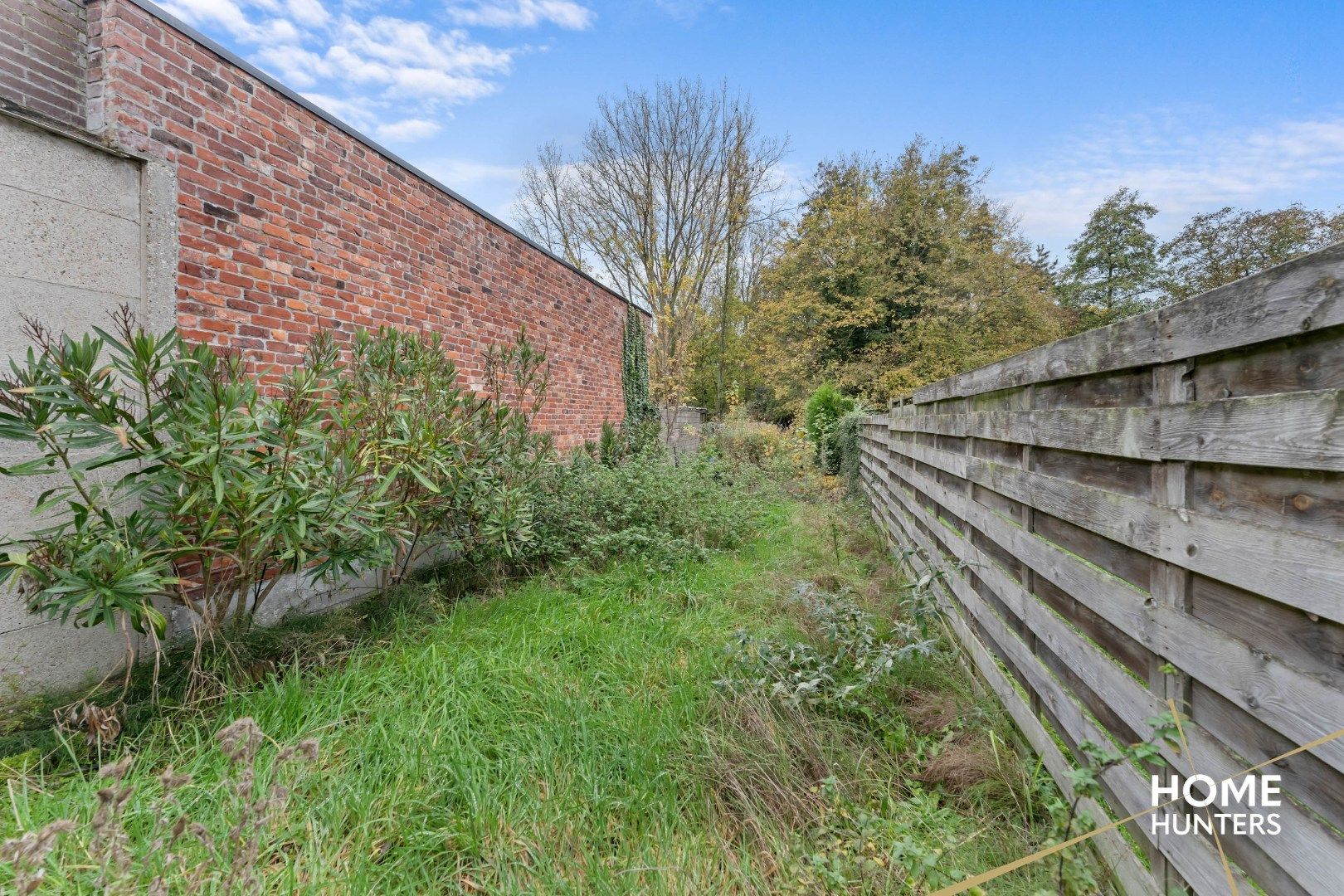 Charmante, op te frissen rijwoning met ruime tuin en 3 slaapkamers foto 11