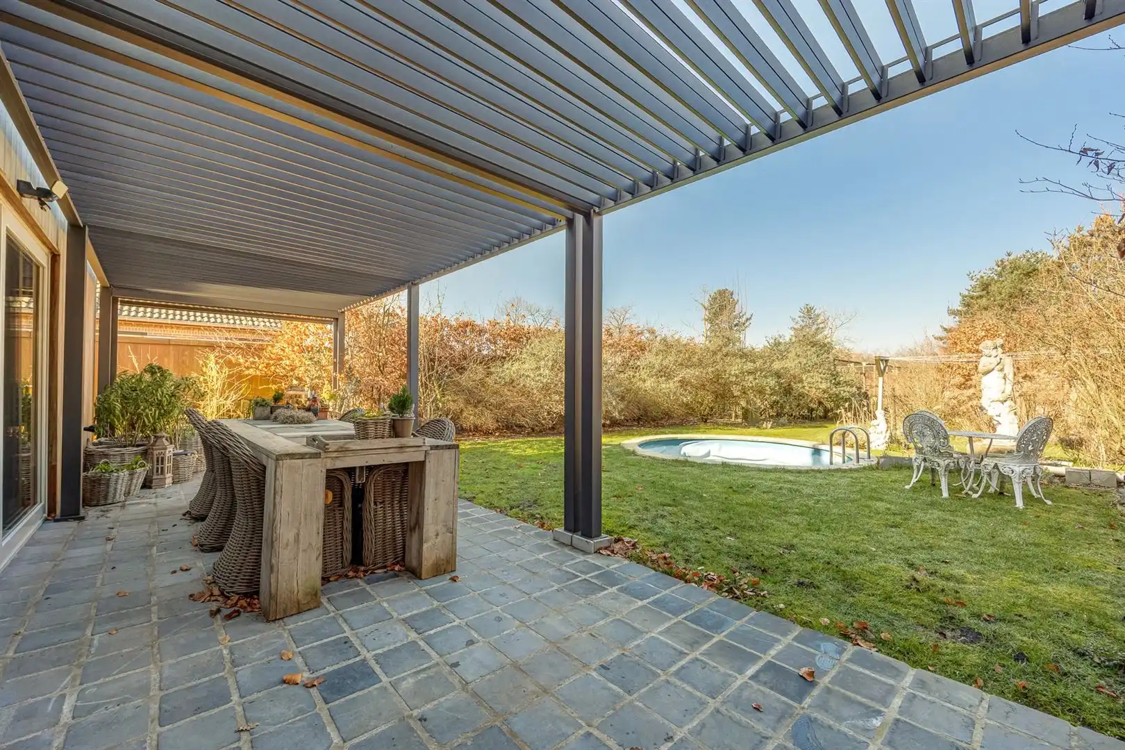 Een thuis vol sfeer met 5 slpks en een mooie tuin! foto 2