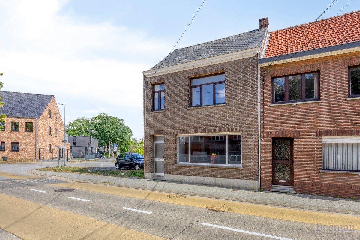 Halfopen bebouwing met 5 garageboxen te koop in Ham foto 2