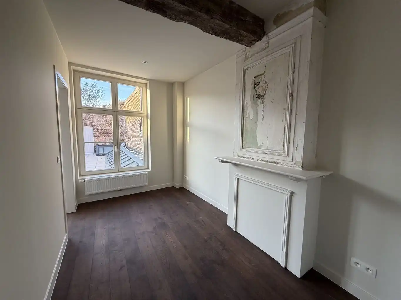 Gezellig, doch ruim appartement op de eerste verdieping met 2 slaapkamers, ruim terras en optioneel een staanplaats, gelegen in het centrum van Maaseik. foto 13
