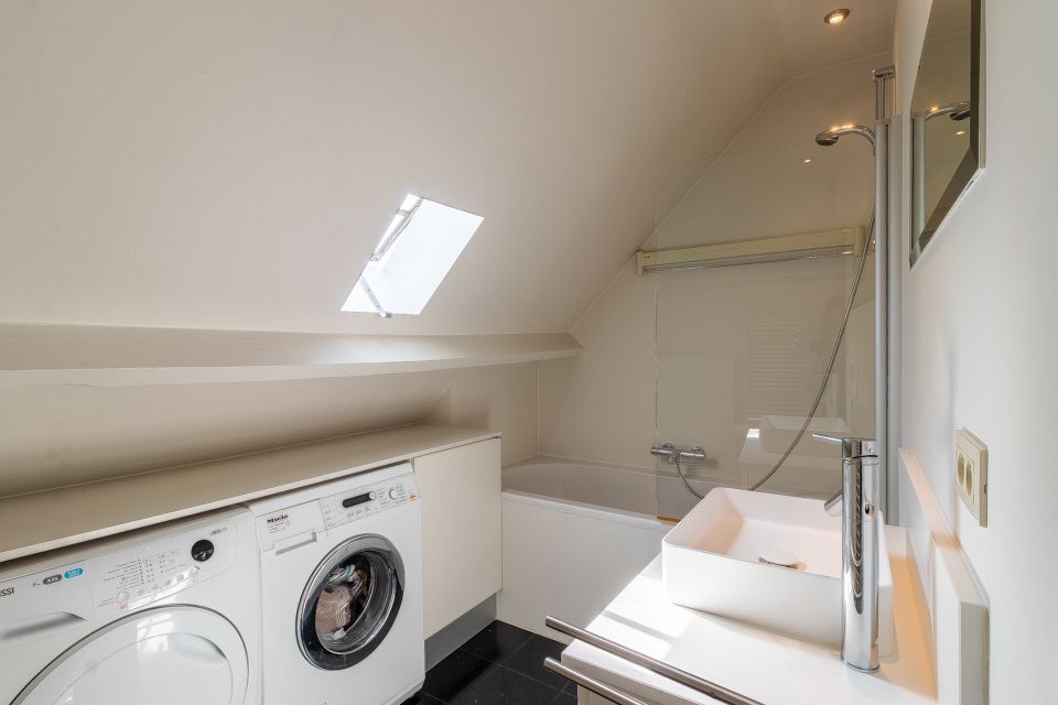 Unieke duplex met hoogwaardige afwerking in het dorpscentrum foto 16