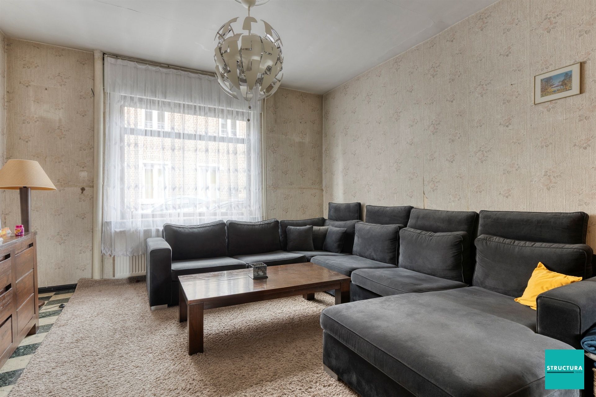 Ruime woning met potentieel in hartje Merchtem
 foto 3