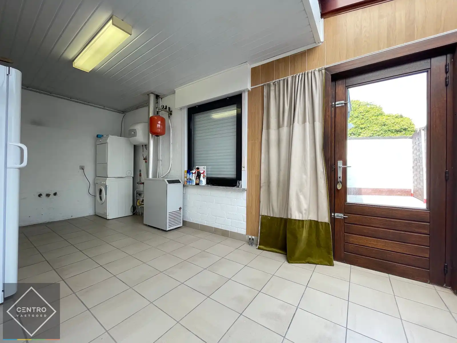 Centraal gelegen woning met 3 slpks, terras én garage! foto 9