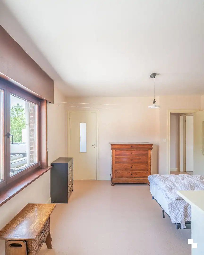 Op te frissen woning met gezellige tuin in het hart van Merelbeke foto 13