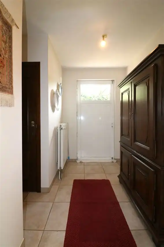 Gusting gelegen woning met 3 slp, garage en tuin foto 34