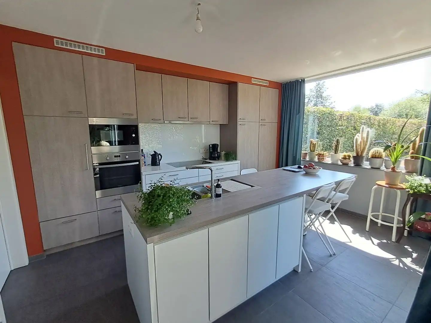Instapklare halfopen woning met ruime zonnige tuin te Oedelem! foto 5