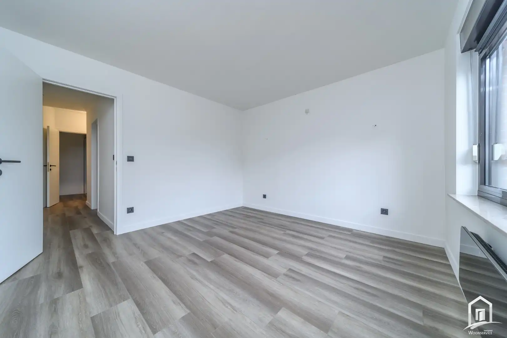 Totaal gerenoveerd gelijkvloers-appartement met tuintje foto 19