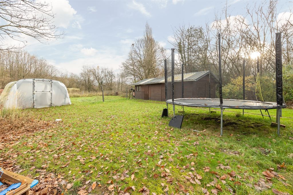 Te renoveren woning met achterliggend weiland foto 18