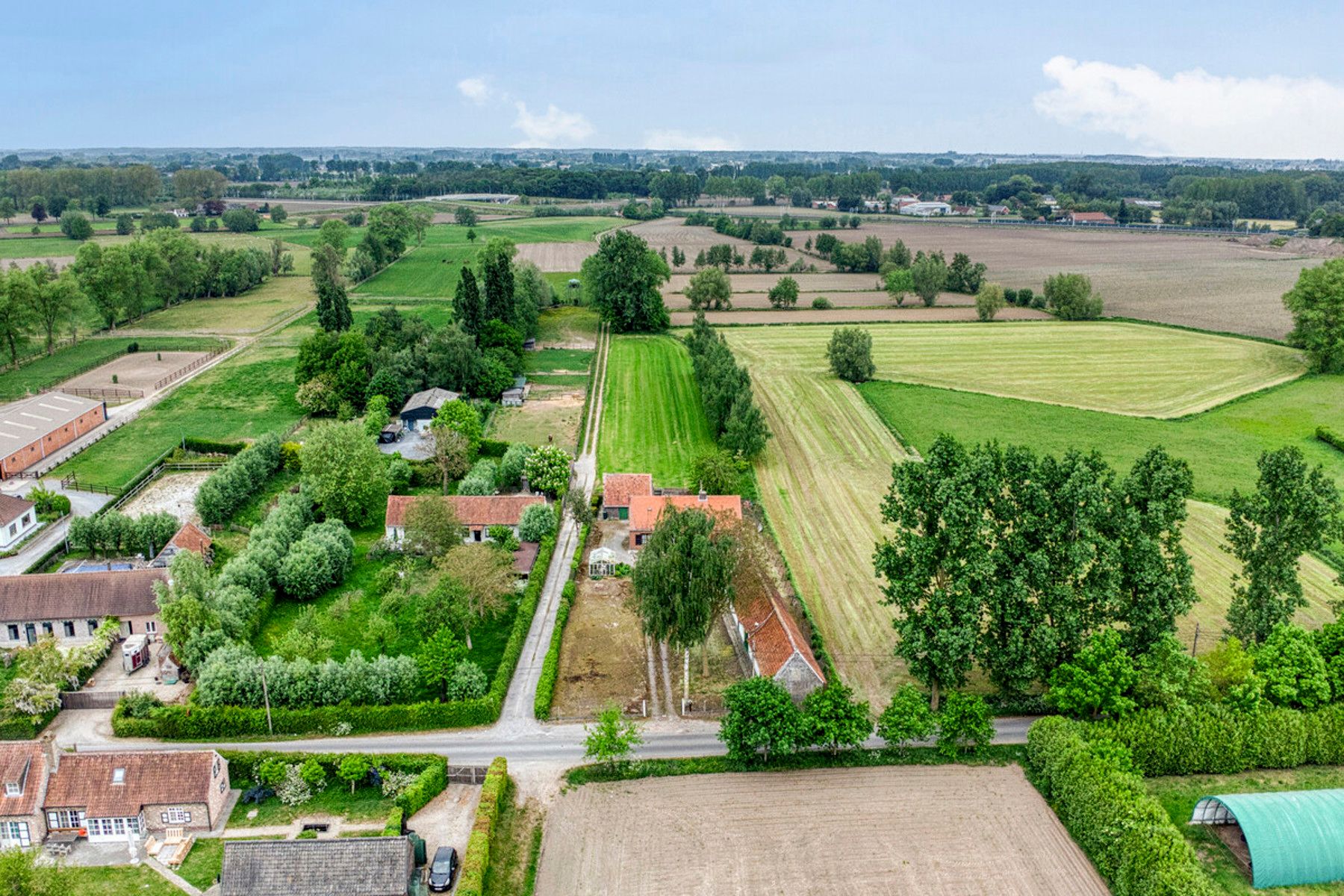 Woning op ruim perceel van 5.490 m² te Hansbeke foto 2
