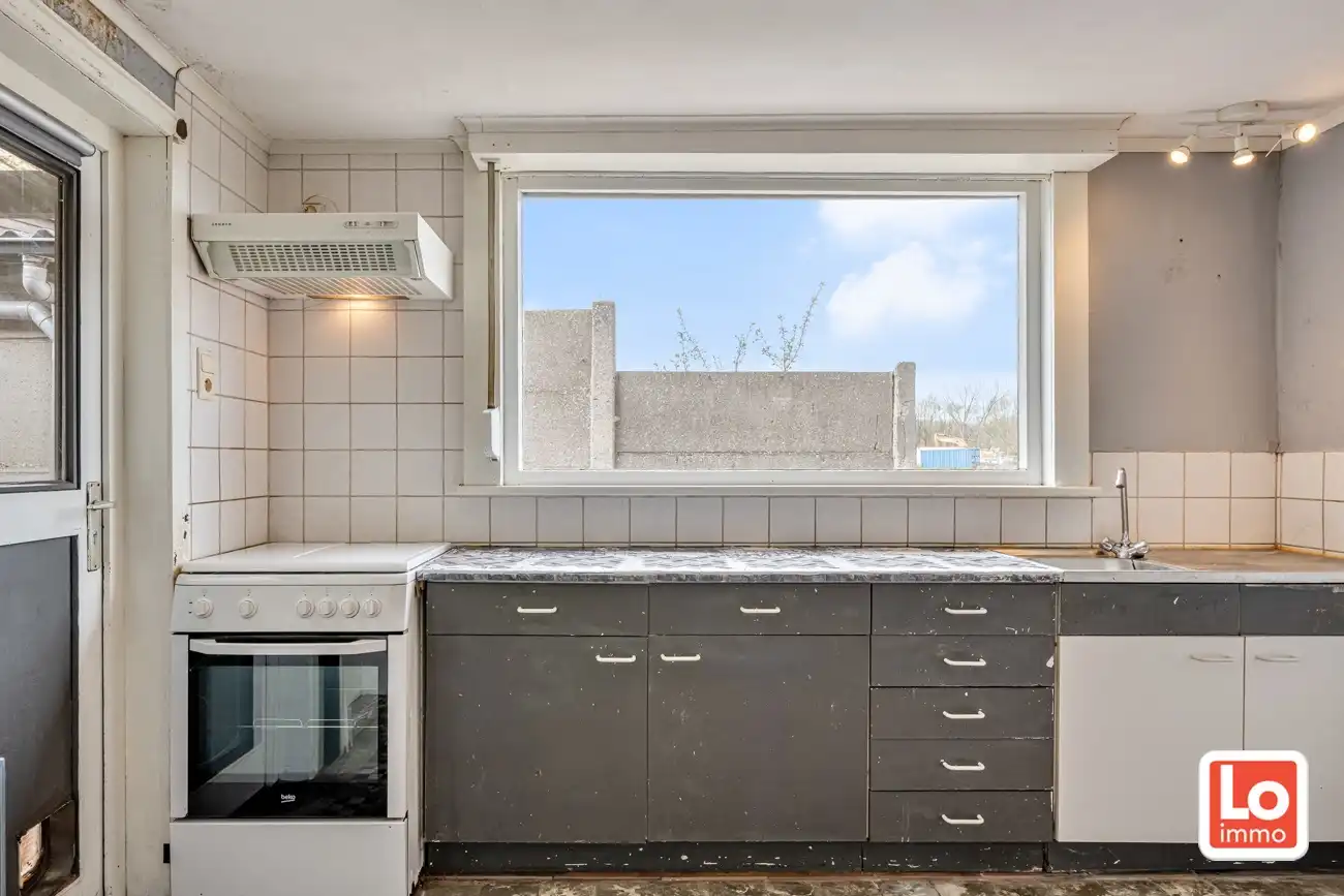 Leuke halfopen starterswoning met afzonderlijke garage en koertje op landelijke locatie in Mendonk. foto 9