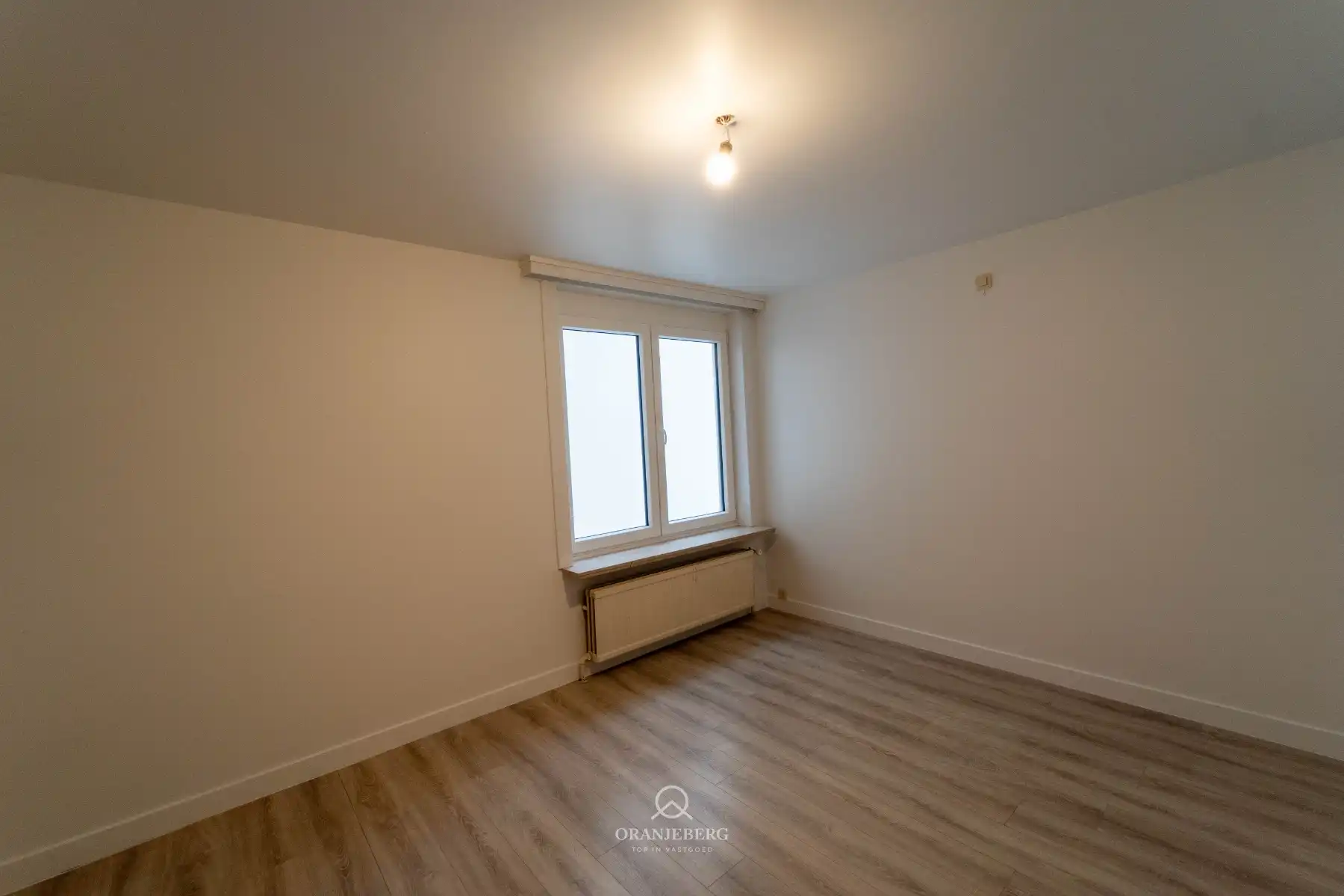Ruim 3-slaapkamerappartement met garagebox foto 6