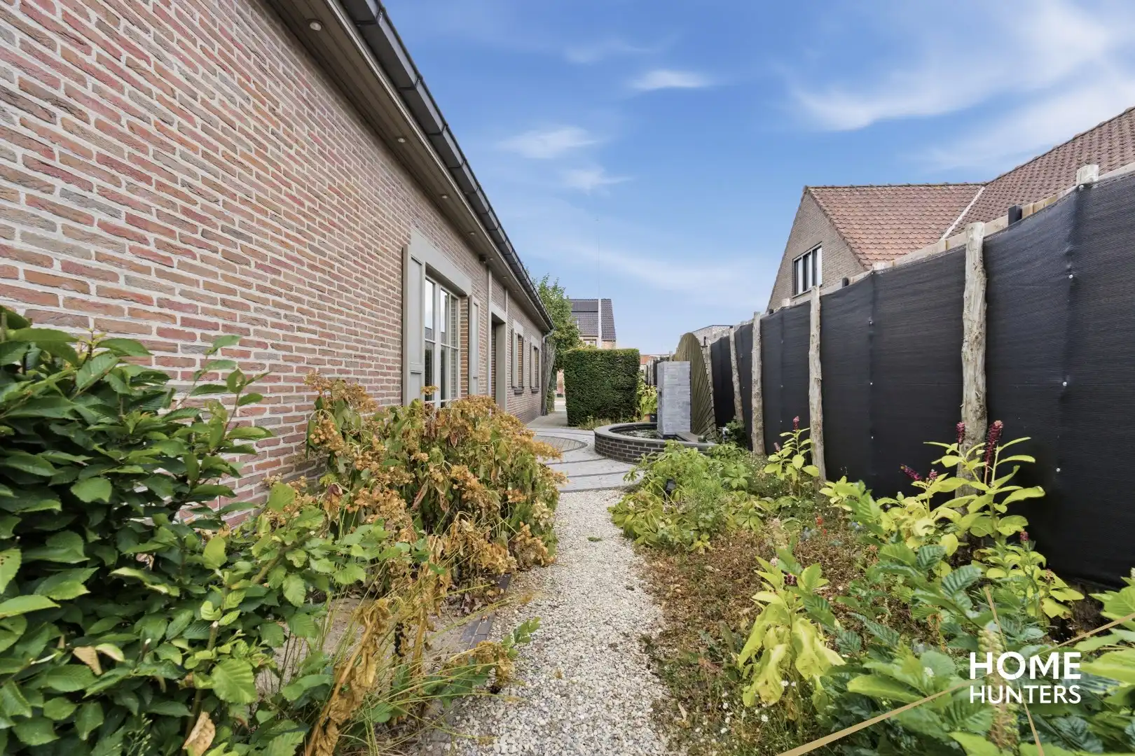 Alleenstaande woning met prachtige tuin en tal van extra troeven in een rustige wijk te Wervik foto 13