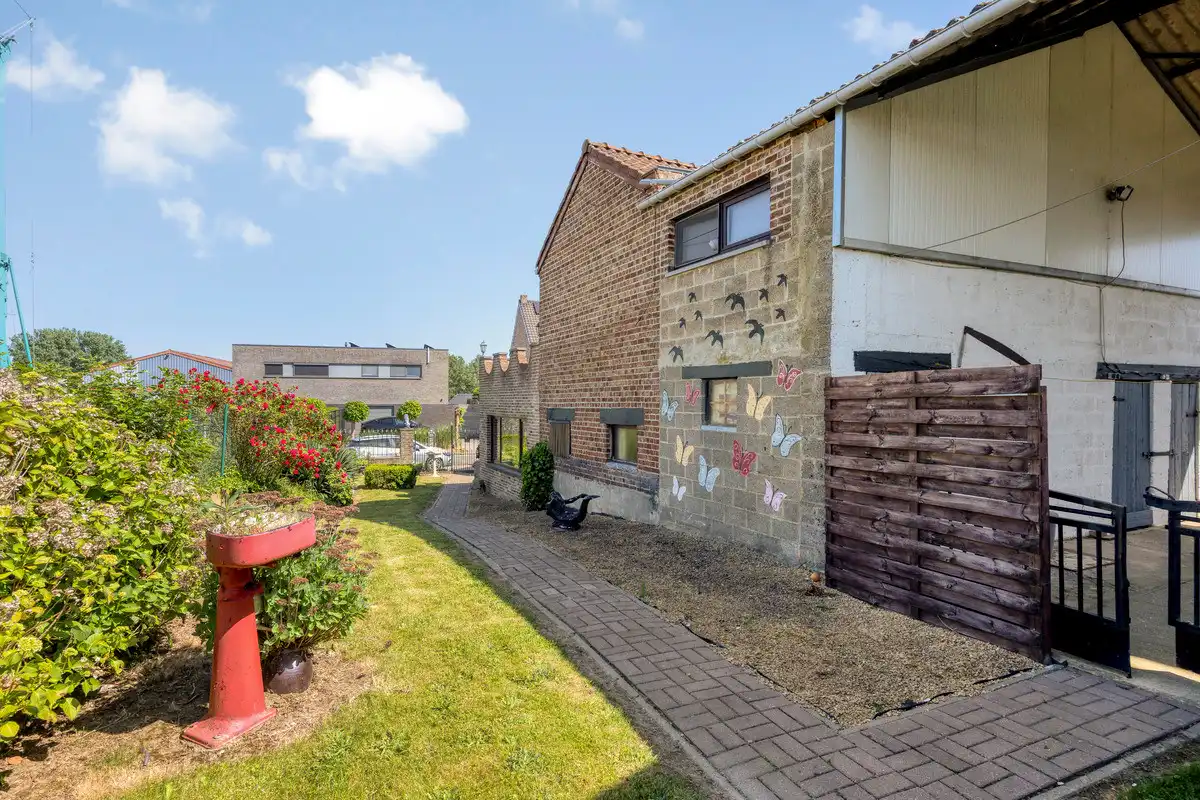 RUSTIG GELEGEN WONING MET ZORGWONING OP CA 15A TE BORGLOON. foto 33