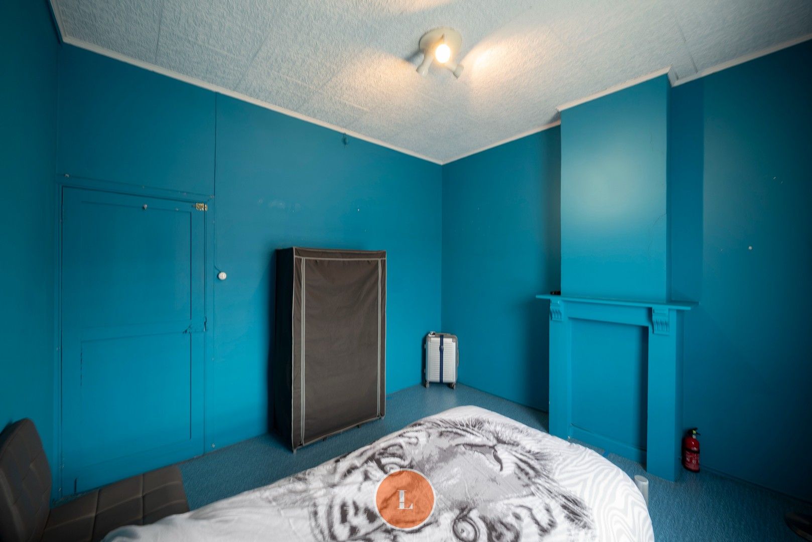Te renoveren woning te koop in centrum Menen foto 10