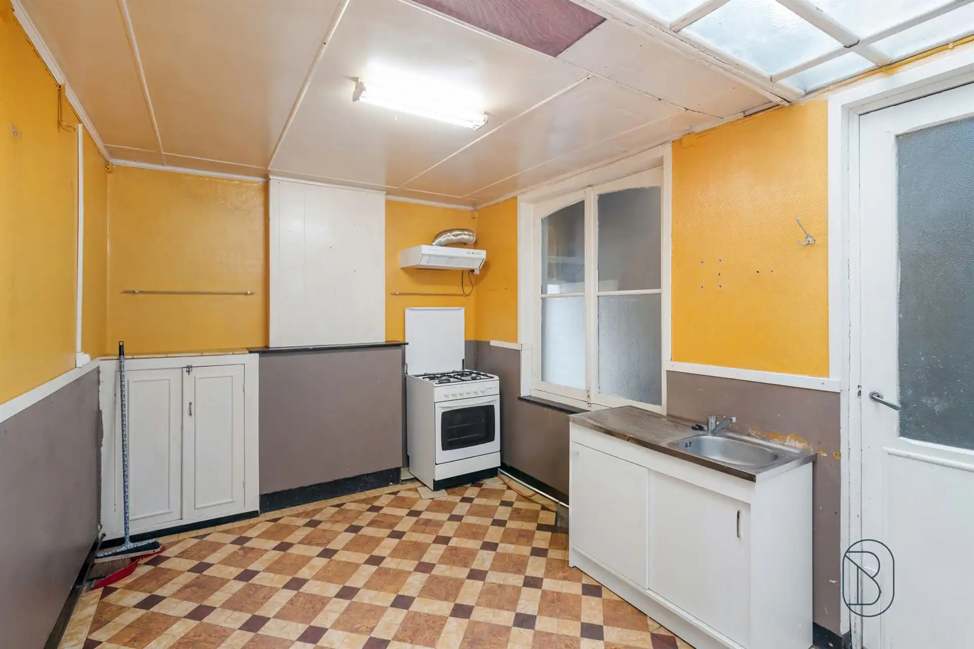 Te renoveren woning in centrum Lessines. foto 7