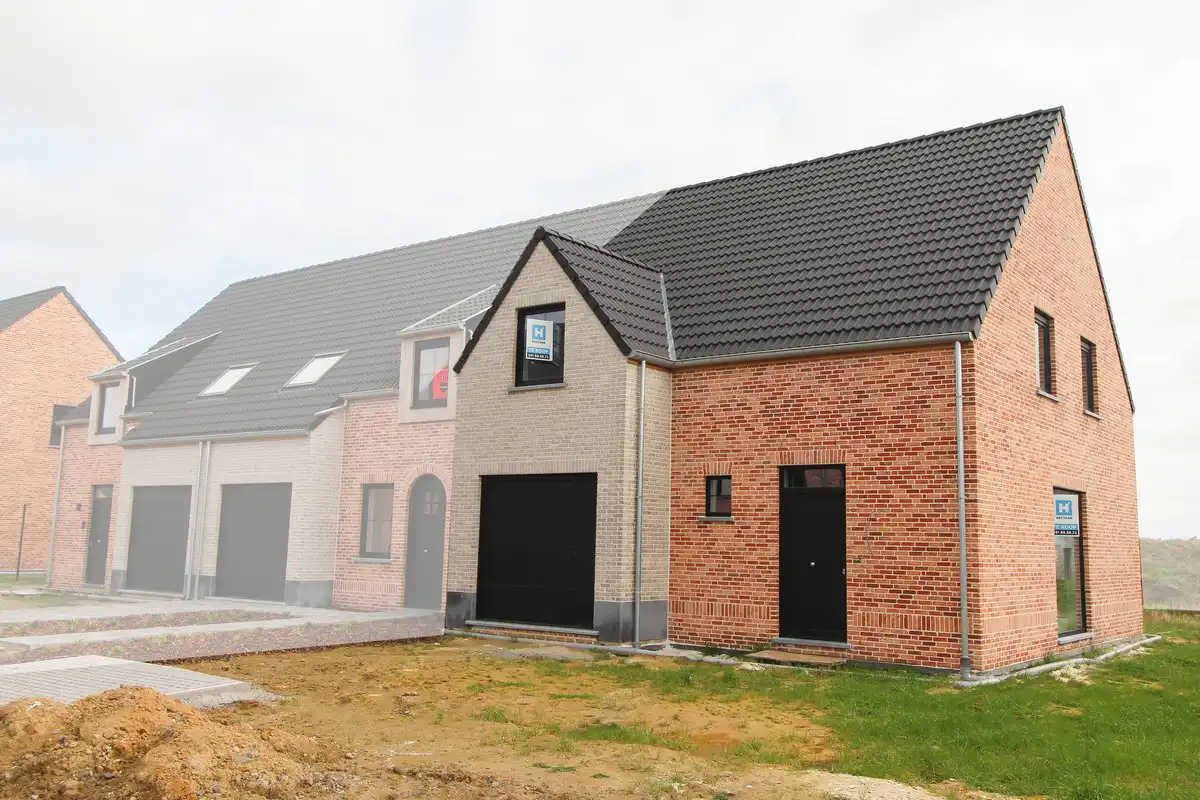 Lichtrijke landelijke nieuwbouwwoningen te Roeselare foto {{pictureIndex}}