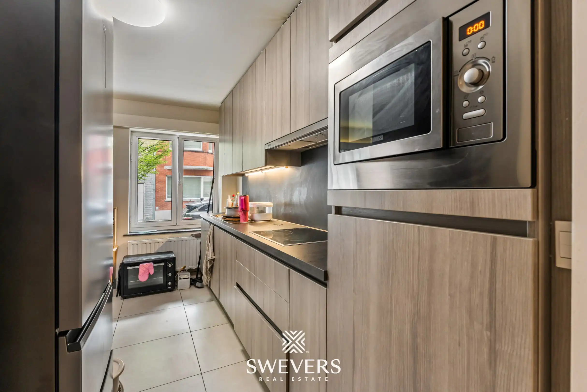 Instapklaar gerenoveerd gelijkvloers appartement met 2 ruime slaapkamers in hartje Hasselt foto 5