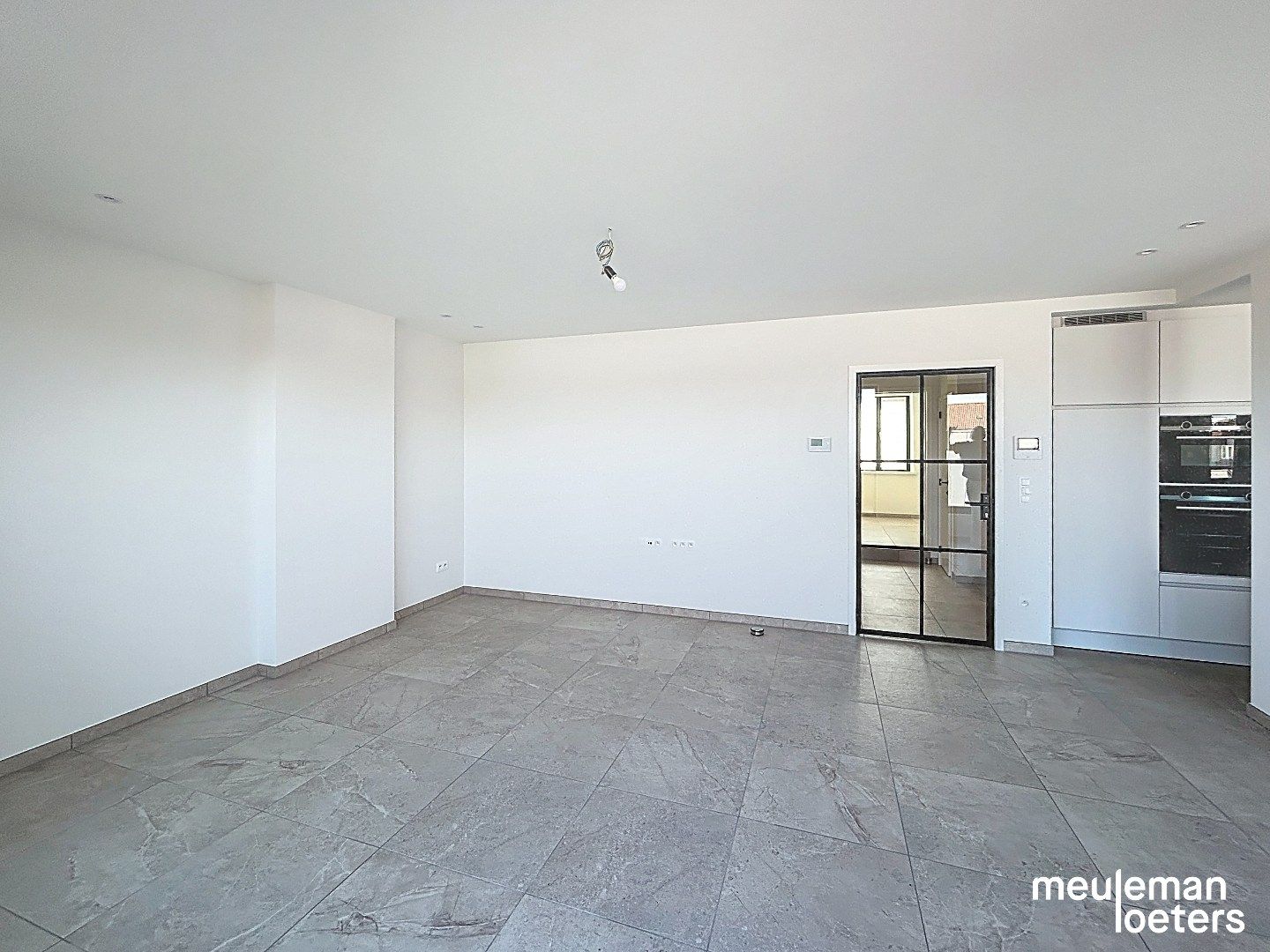 Ruim nieuwbouwappartement met garage foto 2