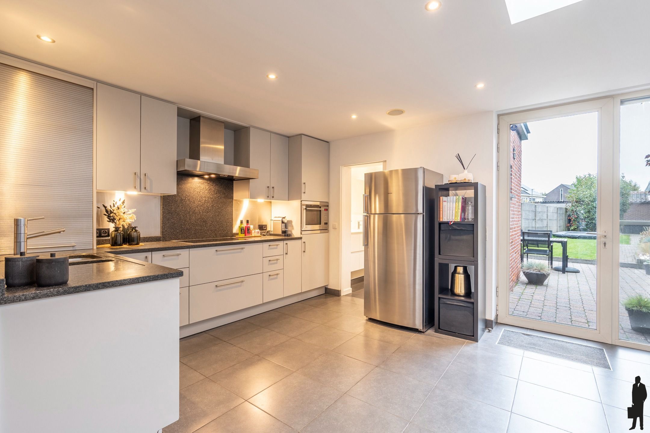 Instapklare stadswoning met diepe tuin en garage. foto 10