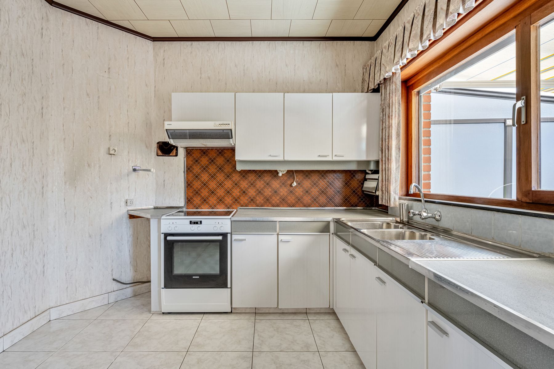 BOTTELARE: te renoveren woning met zuidwest gerichte tuin foto 11