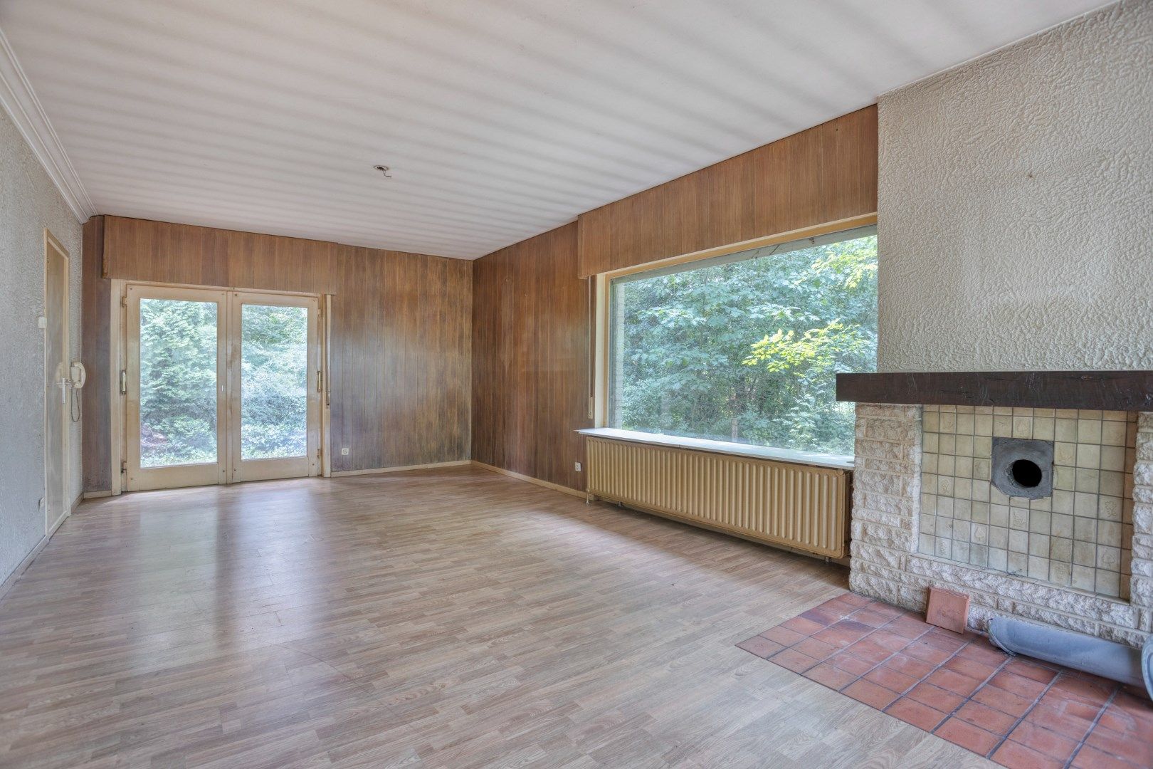 Te renoveren / te slopen woning op een uniek gelegen perceel van 1.693 m² ! foto 4