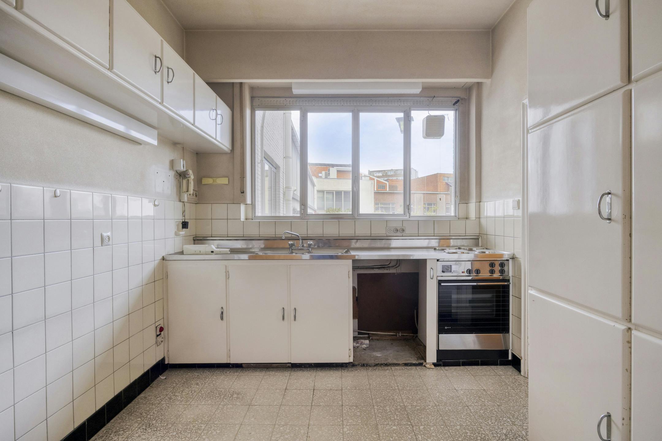 Te renoveren opbrengsteigendom met 3 appartementen en handelspand in Antwerpen foto 51