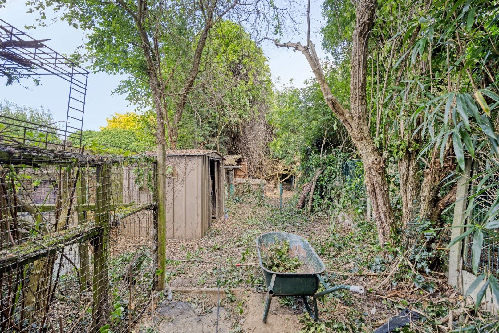 Te renoveren halfopen bebouwing met 3 slaapkamers en ruime tuin in hartje Kessel-Lo  foto 17
