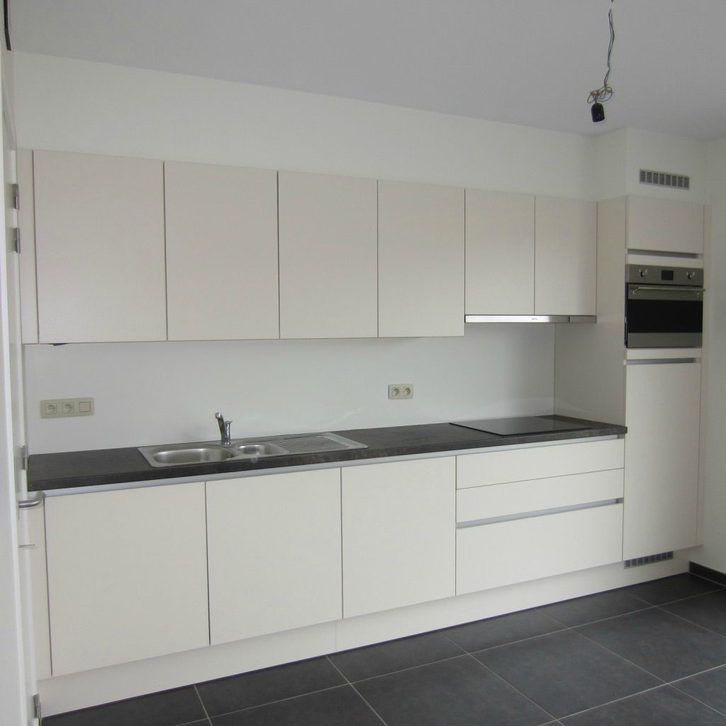 Mooie woning in rustige buurt met tuin en carport foto 3