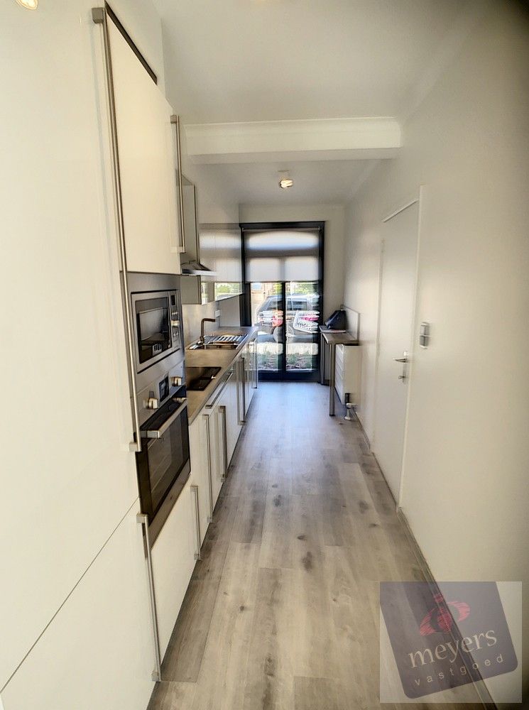Te huur in Hasselt – Gezinswoning met tuin & garage in rustige woonwijk foto 5