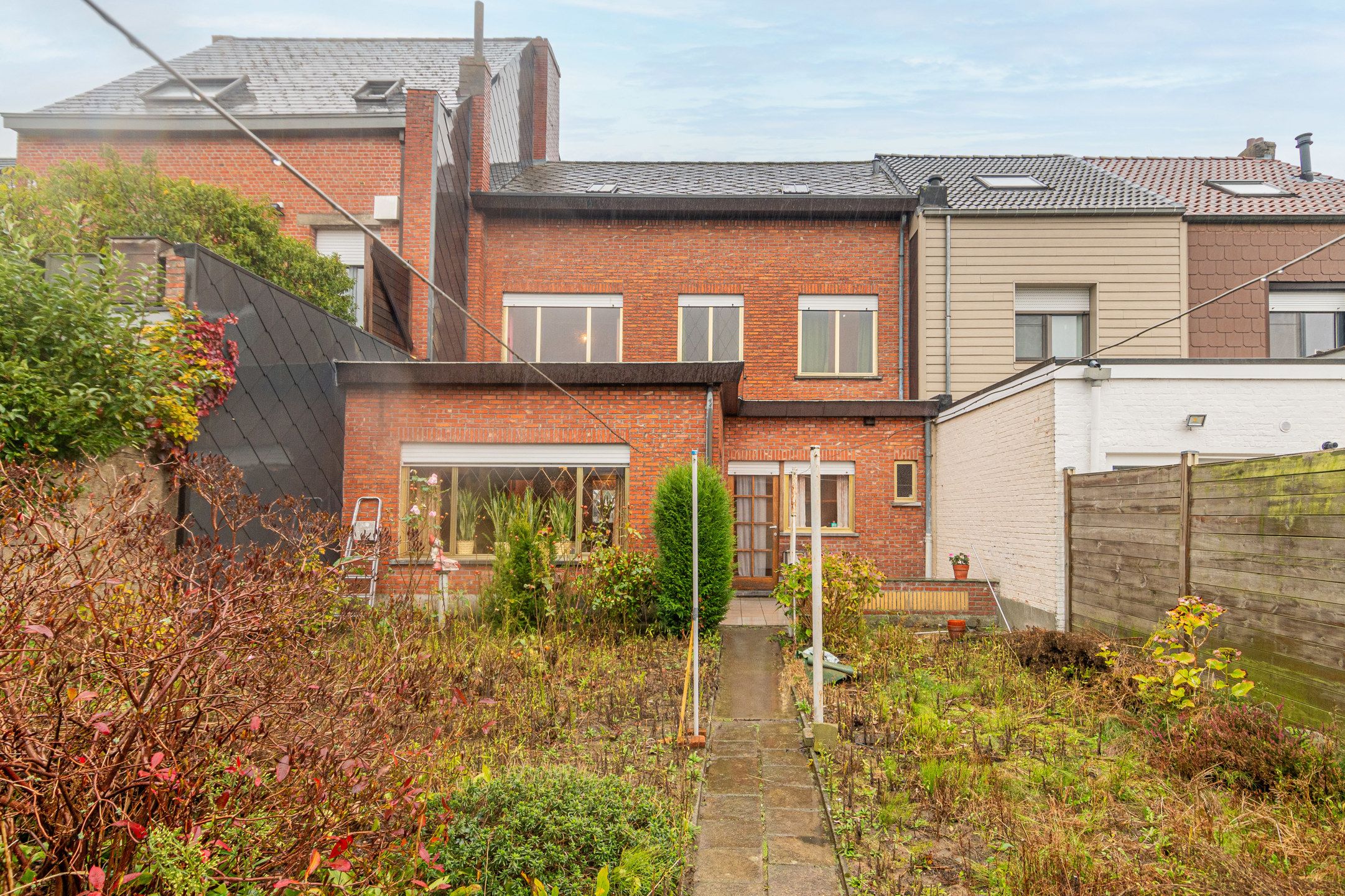 Ruime op te frissen woning met garage en tuin  foto 21