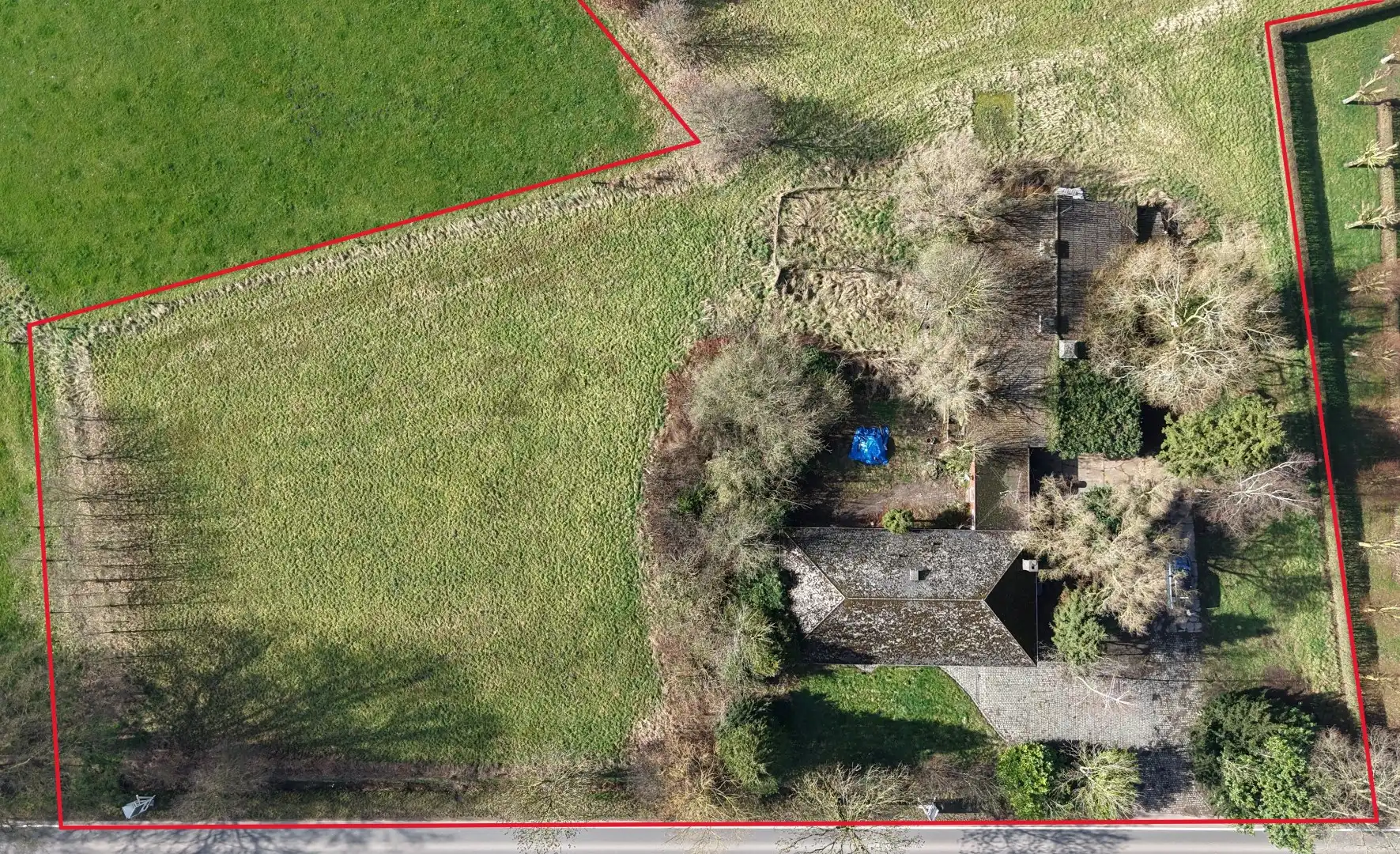 Unieke eigendom op 13.183 m² met te renoveren woning en vergunde stallingen foto 34