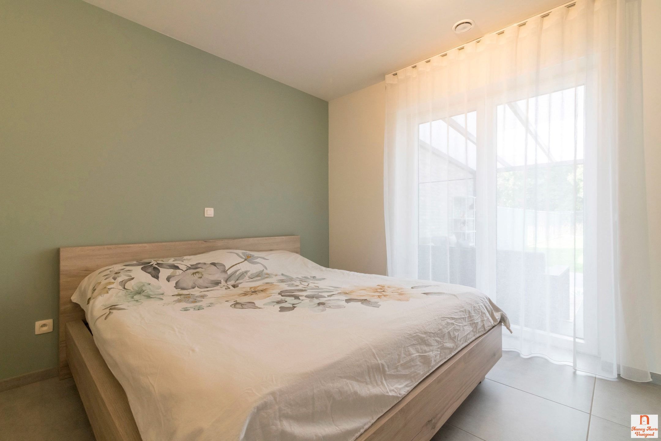 Gelijkvloers appartement met private tuin in Helchteren foto 12