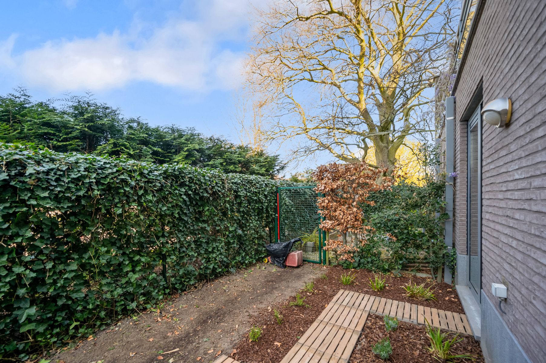 Instapklaar appartement met privé tuin en zonneterras foto 16