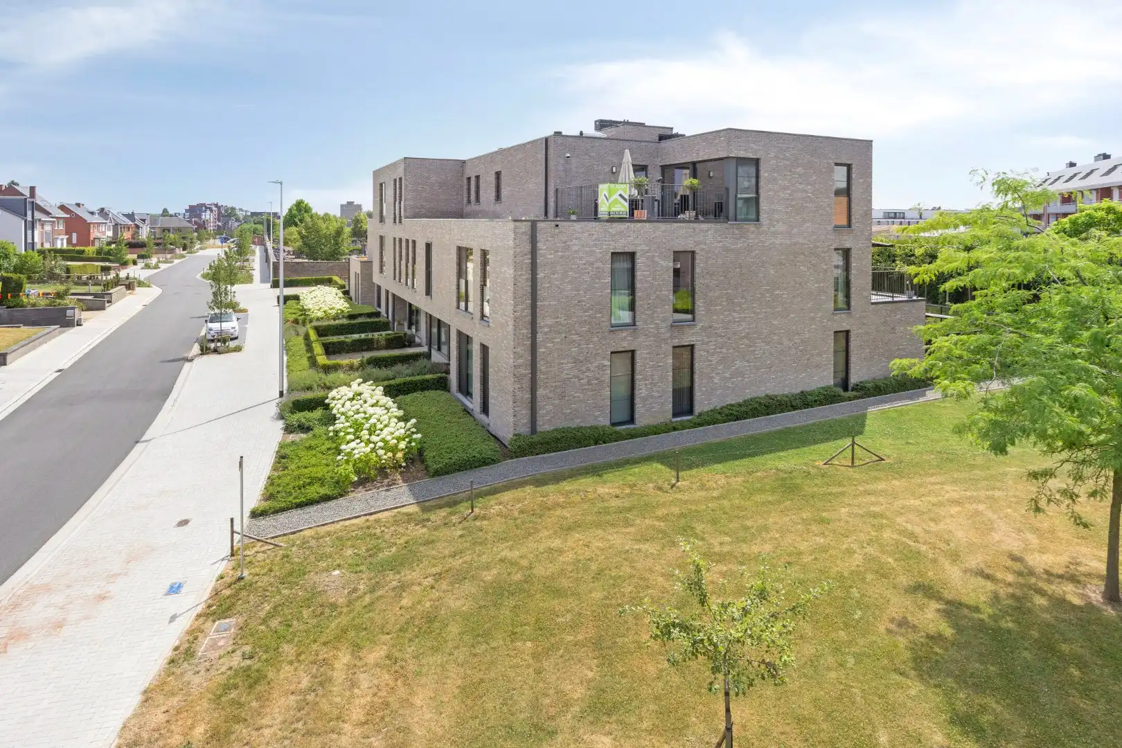 Standaard appartement met terras, lift en garage in het centrum van Tongeren - 2 slaapkamers, bouwjaar 2023, EPC-waarde 72.00, energielabel A, zonnige tuin op h foto 30