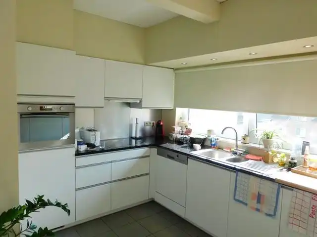 Ruim appartement met autostaanplaats vlakbij het centrum foto 6