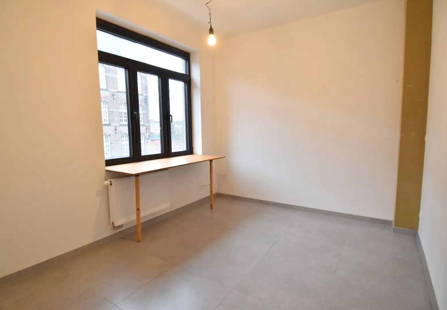 Rijwoning met 3 slaapkamers en tuin in Kortrijk foto 11