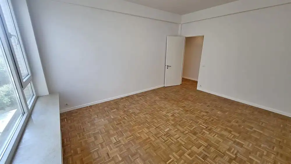 Ruim appartement met terras + Optie aankoop garagebox foto 14