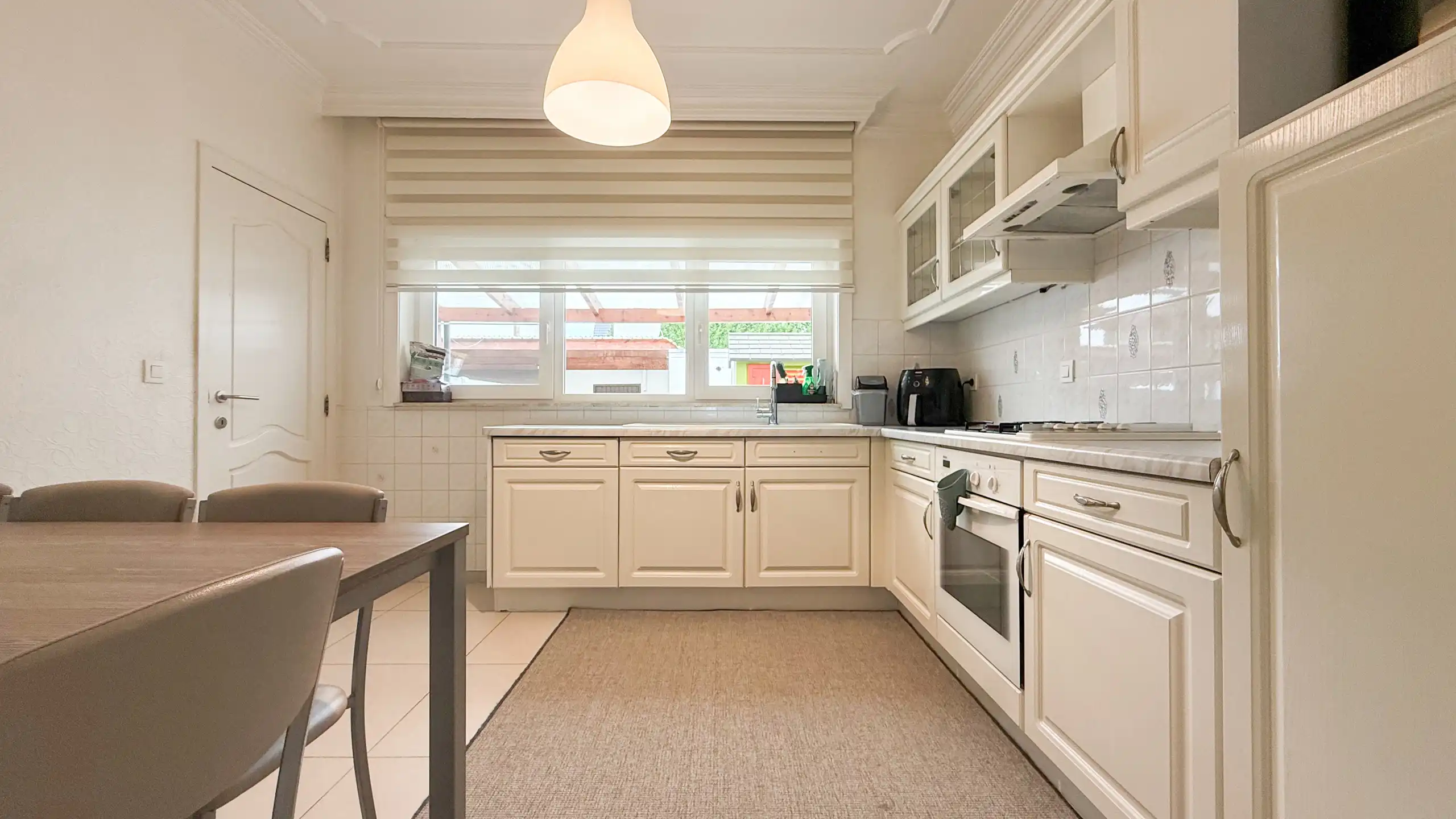 Gezinswoning met 4 slaapkamers centraal in Heusden! foto 7