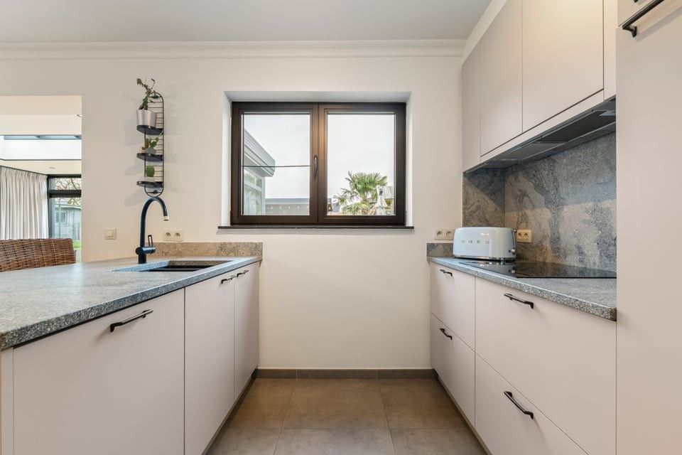 GEZELLIGE INSTAPKLARE GEZINSWONING MET 3 SLAAPKAMERS EN GARAGE IN KOZEN foto 12