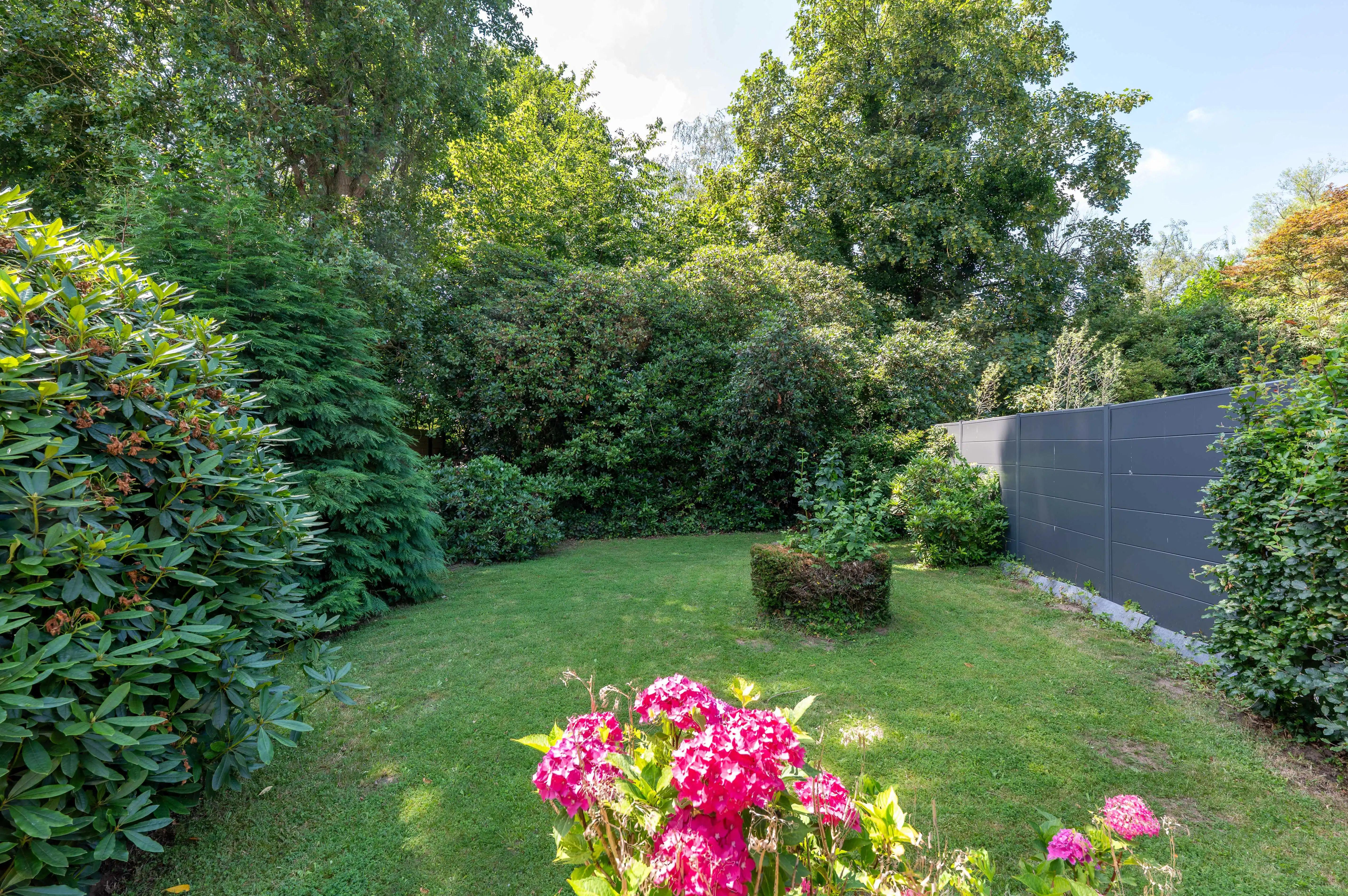 Halfopen bebouwing met veel potentieel, zonnige tuin en garage in Kapellen! foto 23