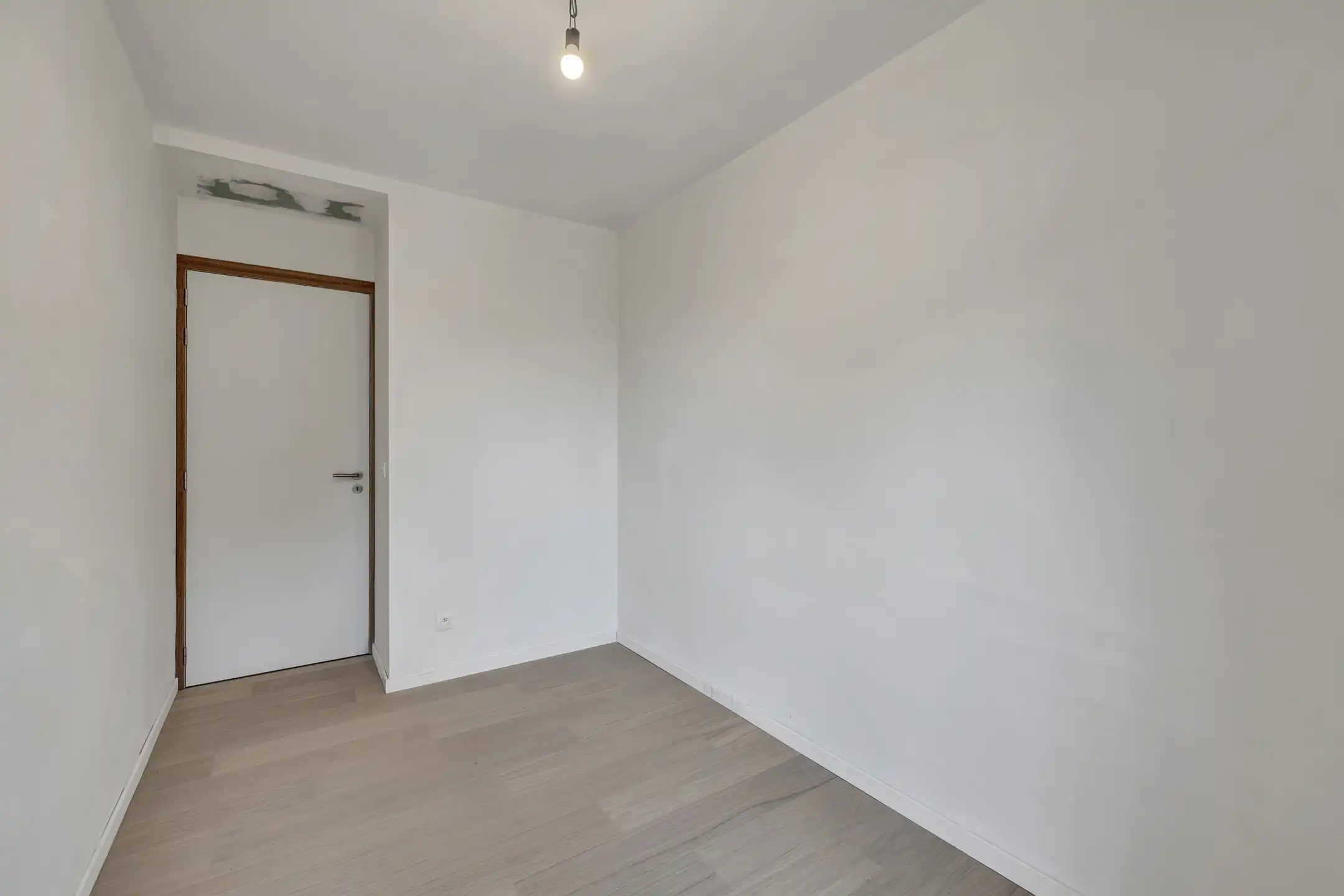 Gelijkvloers appartement met 2 slpks in uniek woonerf foto 12