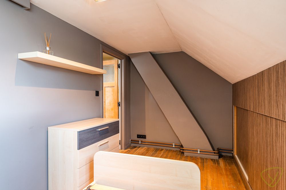 Ruime woning met zonnige tuin en veel potentieel in de Desire Goethalsstraat foto 18