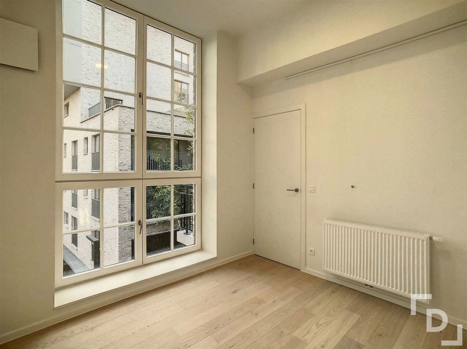 Nieuwbouwappartement in hartje Ieper foto 2