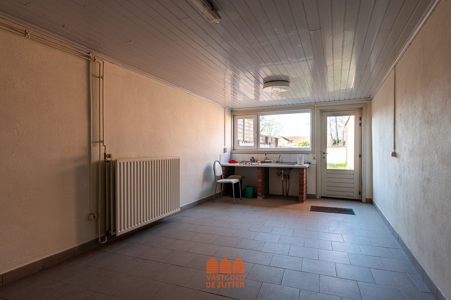 Ruime woning met handelspand in het centrum van Boekhoute foto 25