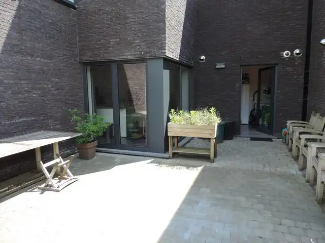 Rustig gelegen gelijkvloers appartement met tuin en carport foto 13
