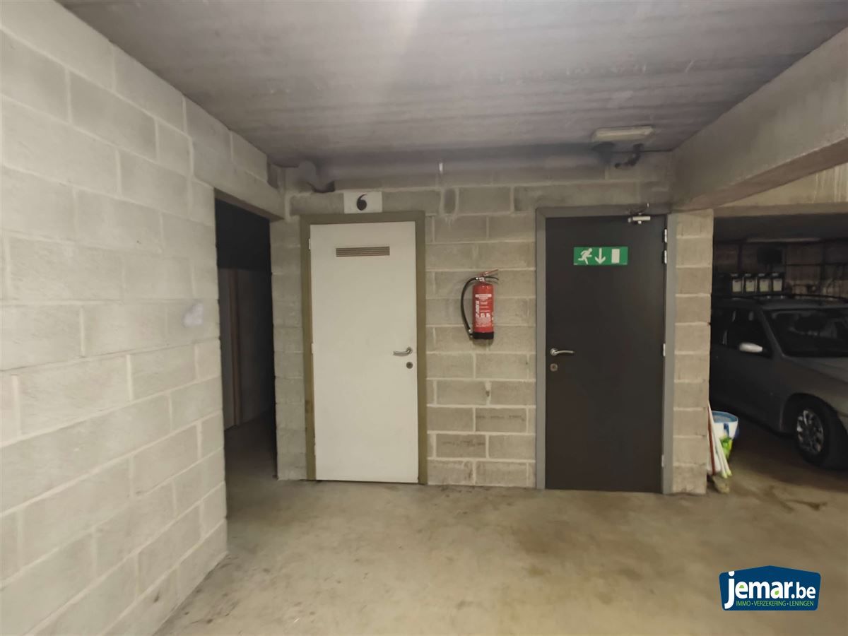 Gelijkvloers duplex appartement met 1 slaapkamer, tuin, berging en parking foto 15