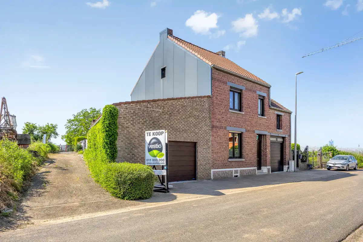 RUSTIG GELEGEN WONING MET ZORGWONING OP CA 15A TE BORGLOON. foto 44