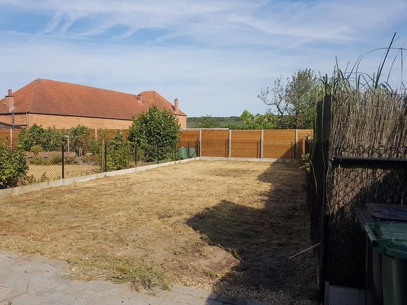 Gezellig gelijkvloers appartement met tuin, autostaanplaats en kelderberging foto 12