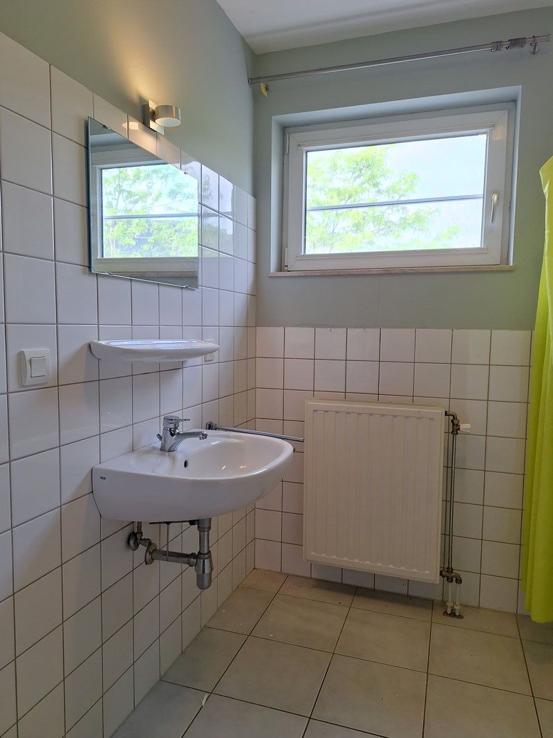 Stijlvol gelijkvloers appartement met terras en autostandplaats foto 14