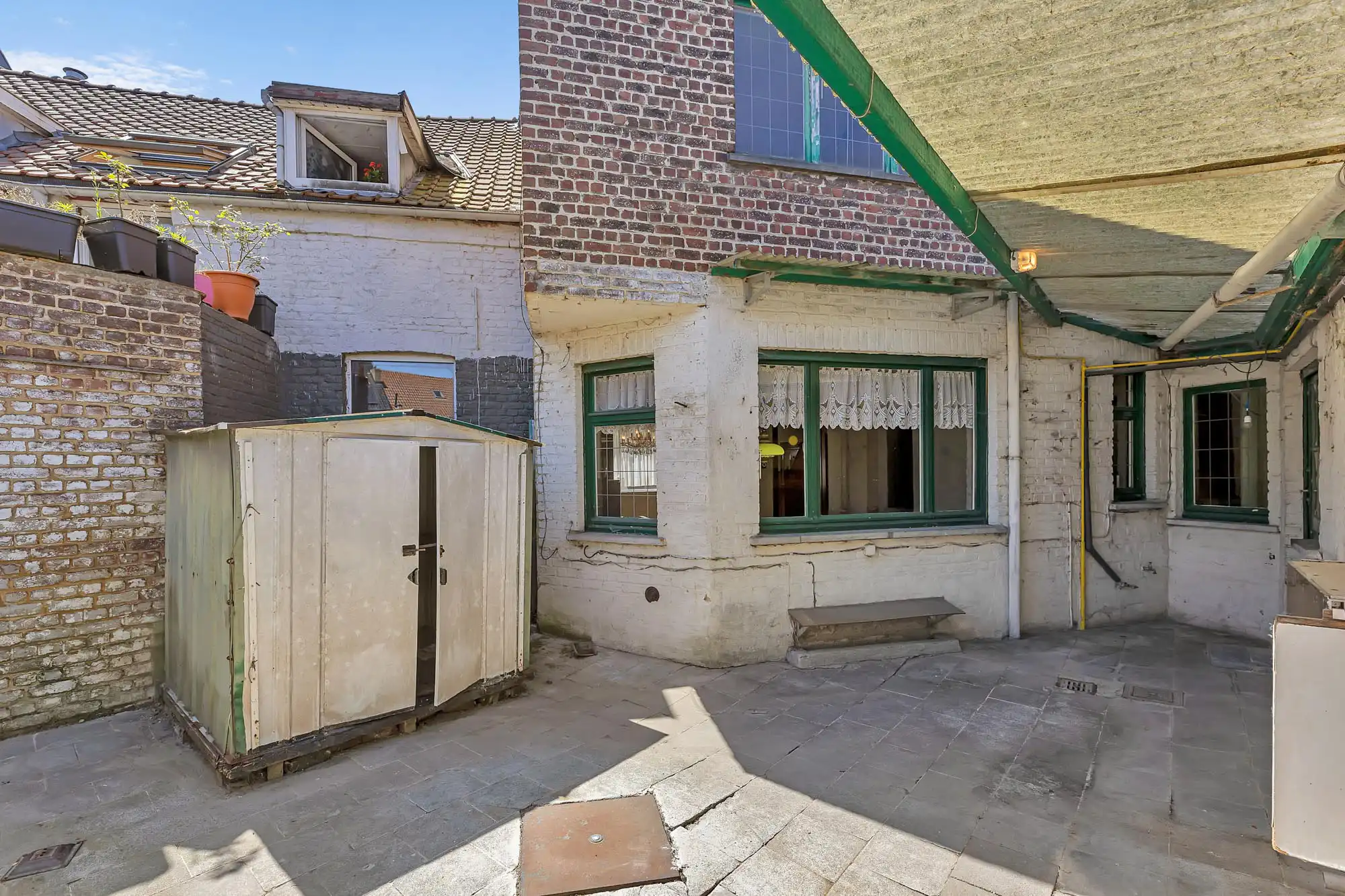 Te renoveren woning met garage foto 18